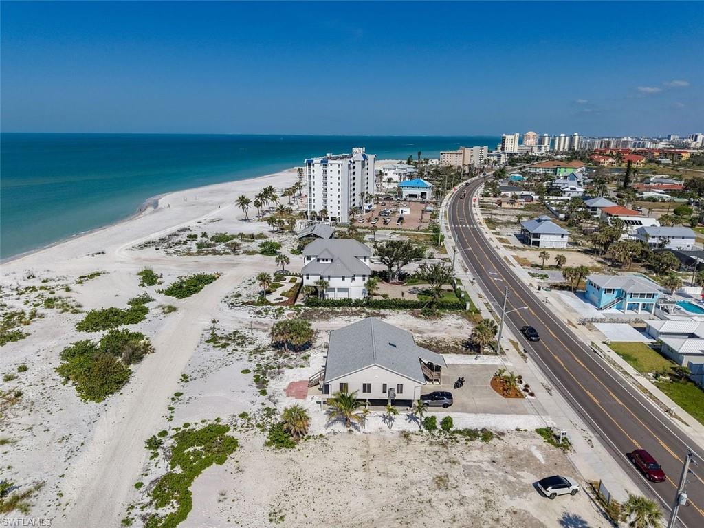Bird's eye view of waterfront with a beach
