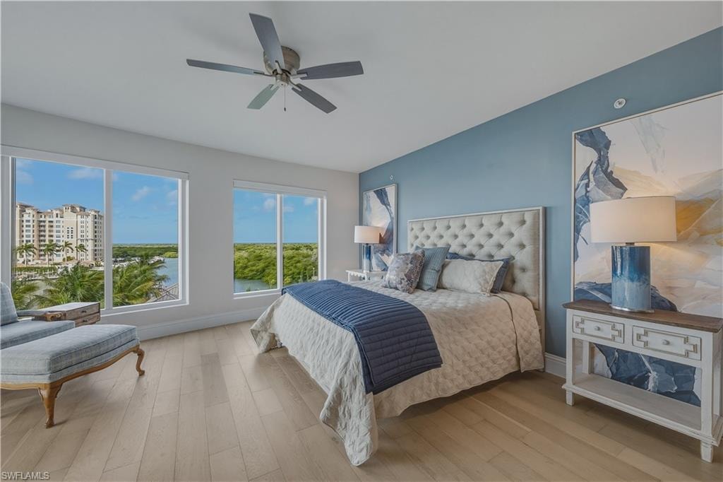 Bedroom featuring light wood-style flooring and ceiling fan