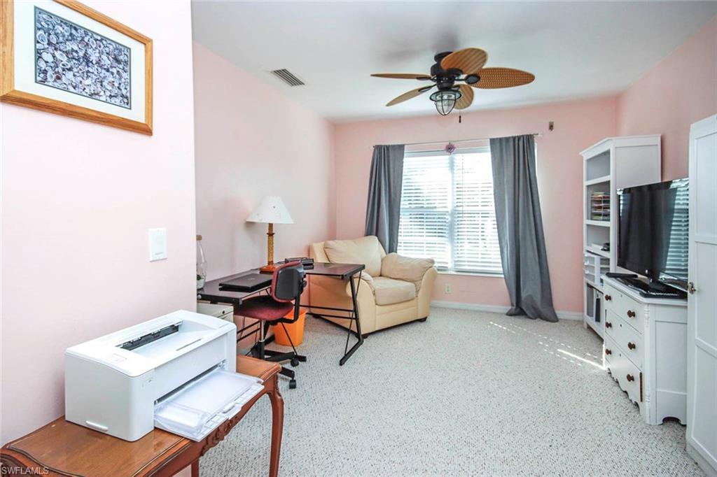 Office/3rd bedroom featuring a ceiling fan and light carpet