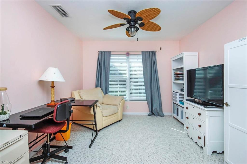 Office space/3rd bedroom featuring a ceiling fan and light colored carpet