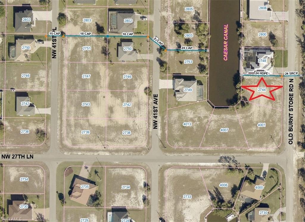 Aerial view of property's location with property parcel outlined