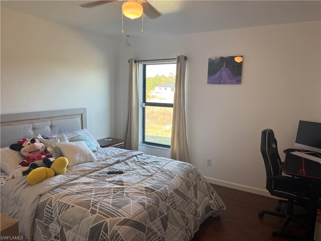 2nd guest bedroom with backyard view