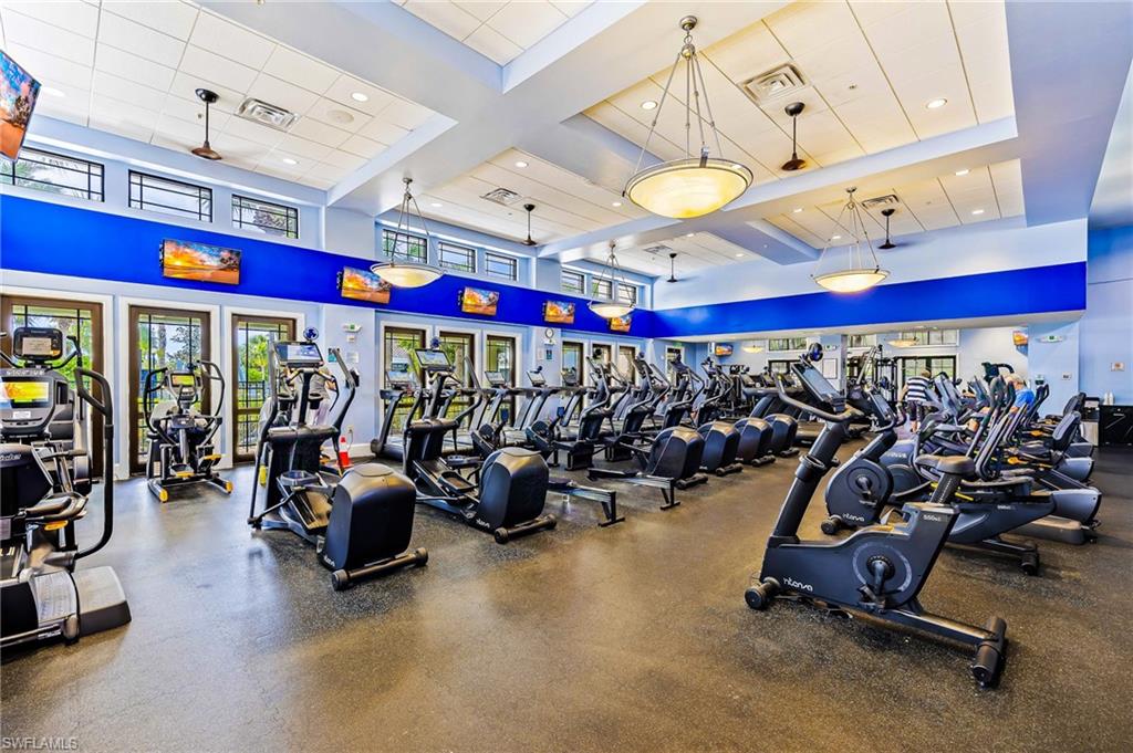 Exercise room featuring recessed lighting