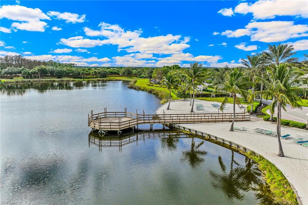 Dock area featuring a water view
