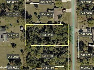 Aerial overview of property's location with property parcel outlined