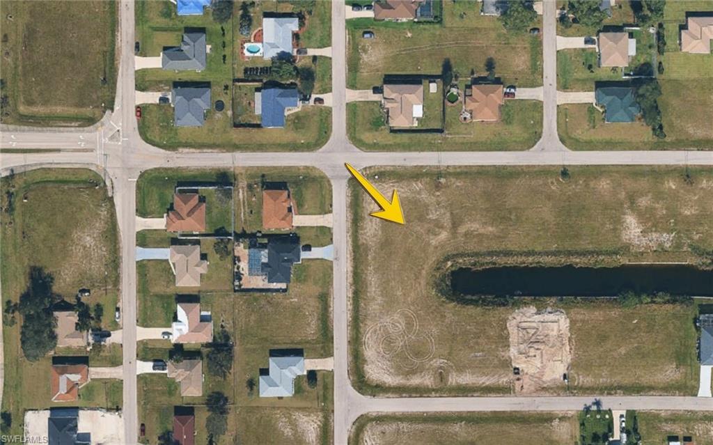 Aerial overview of property's location with nearby suburban area