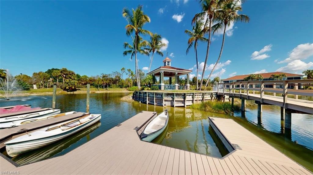 Dock featuring a water view and a gazebo