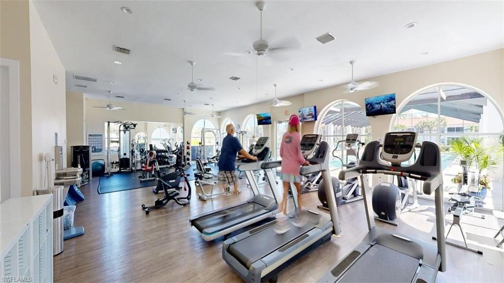 Workout area featuring recessed lighting