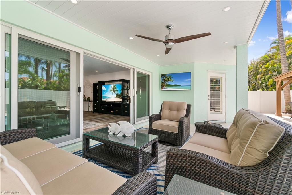 View of patio / terrace featuring ceiling fan and an outdoor living space