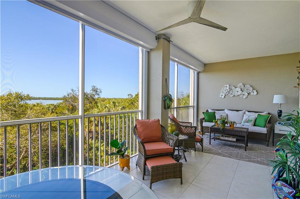 Sunroom / solarium featuring tile patterned floors