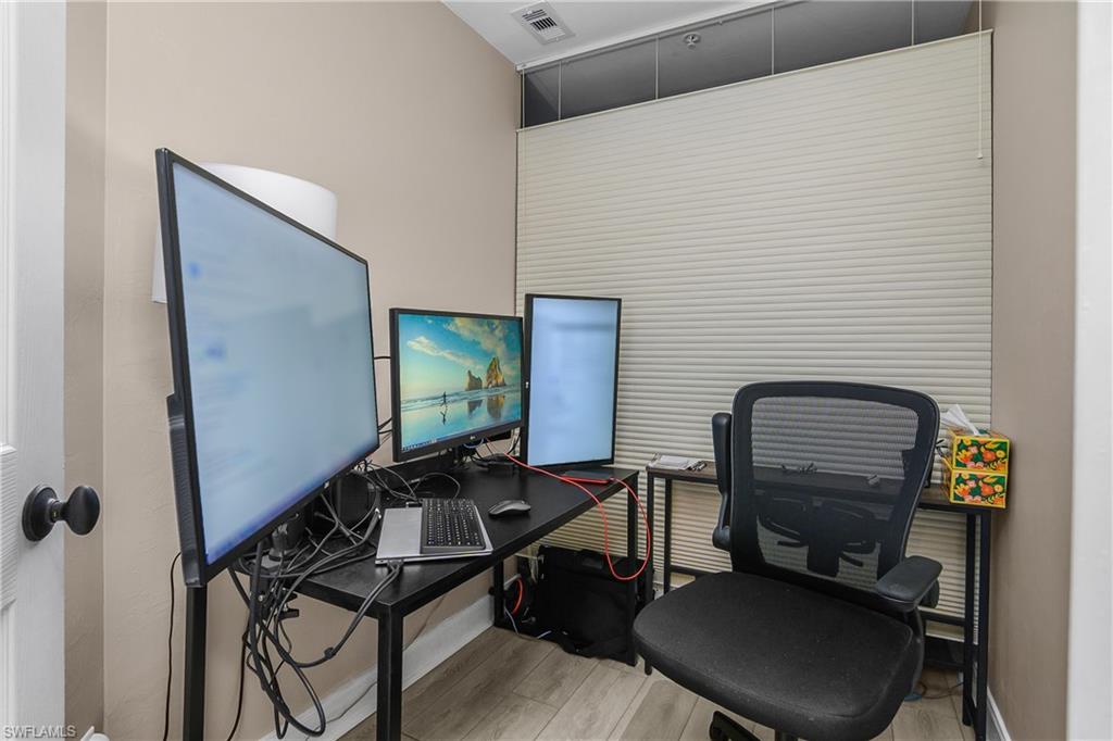 Office featuring light wood finished floors and baseboards