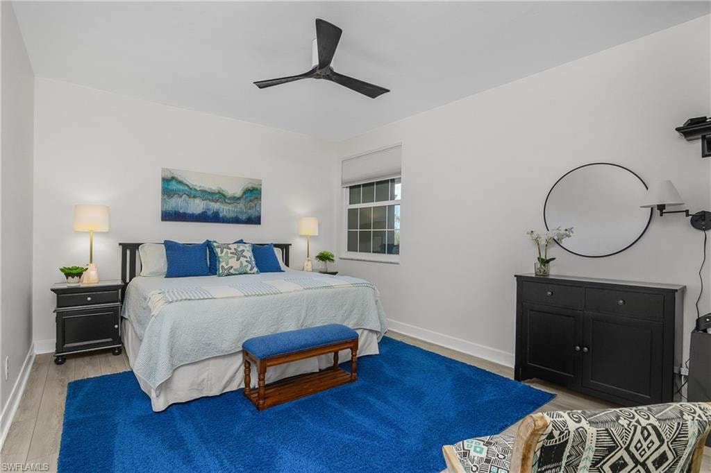 Bedroom featuring ceiling fan and light wood-style floors