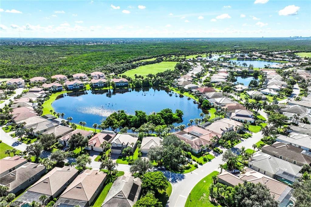 Aerial view of residential area with a nearby body of water