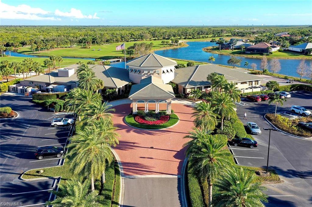 Bird's eye view of a nearby body of water and a local golf course