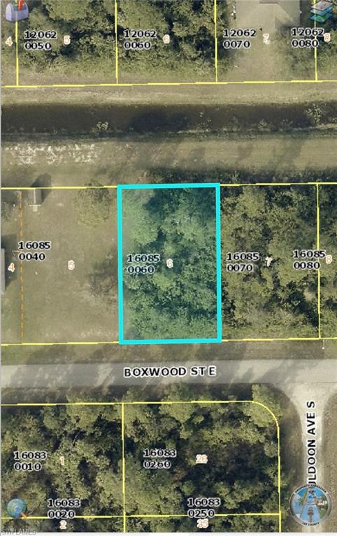 Aerial map of property and surrounding area with property boundaries highlighted