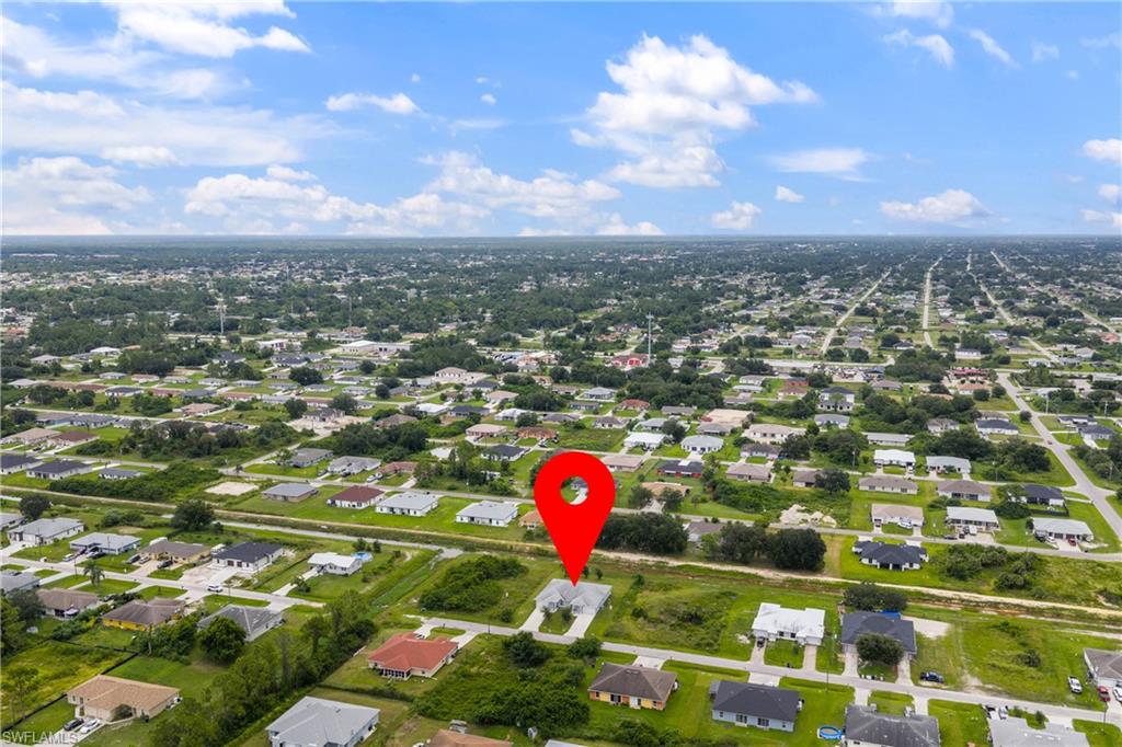 View of property location featuring nearby suburban area