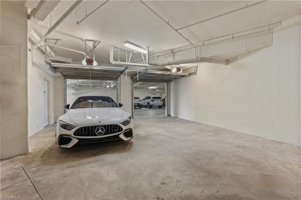 enclosed private 2 car gagre with additional a/c storage