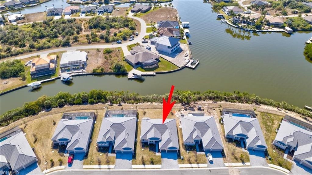 Aerial view of residential area with a large body of water