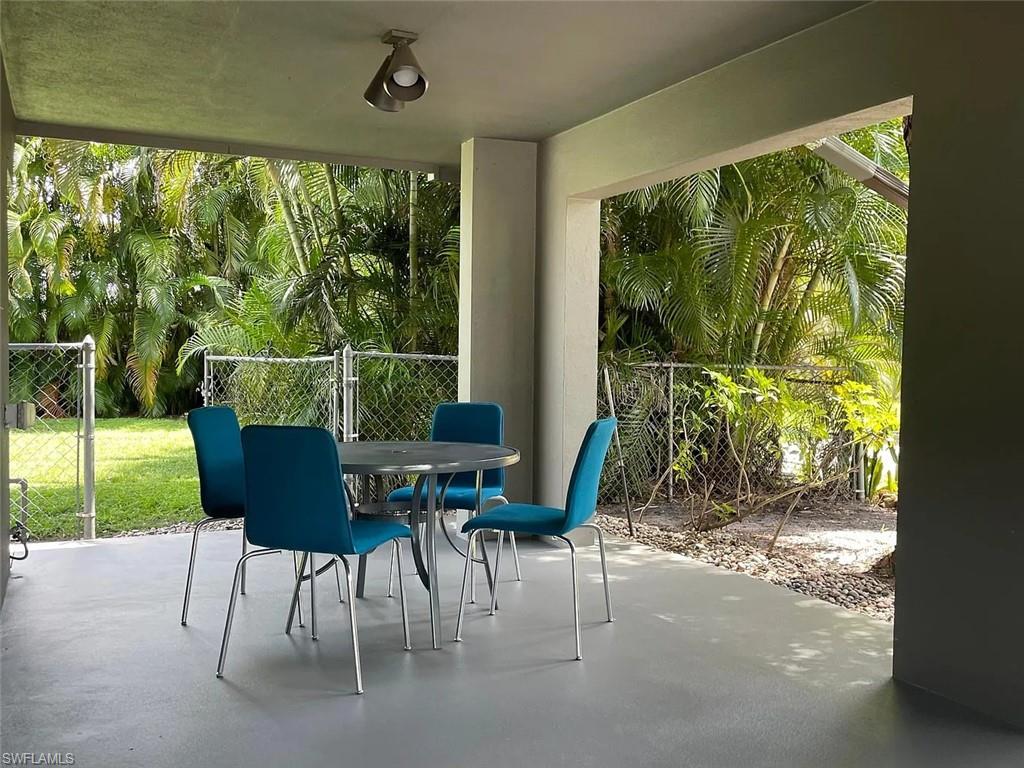 View of patio featuring outdoor dining area