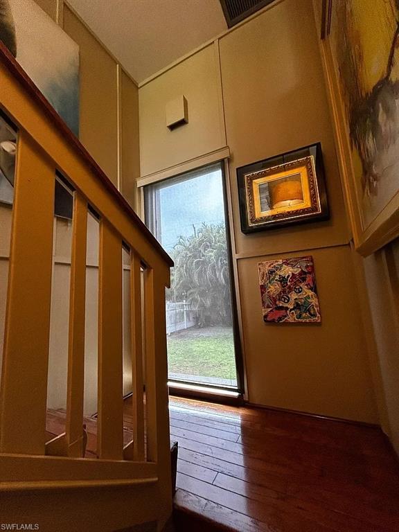 Doorway to outside featuring hardwood / wood-style flooring