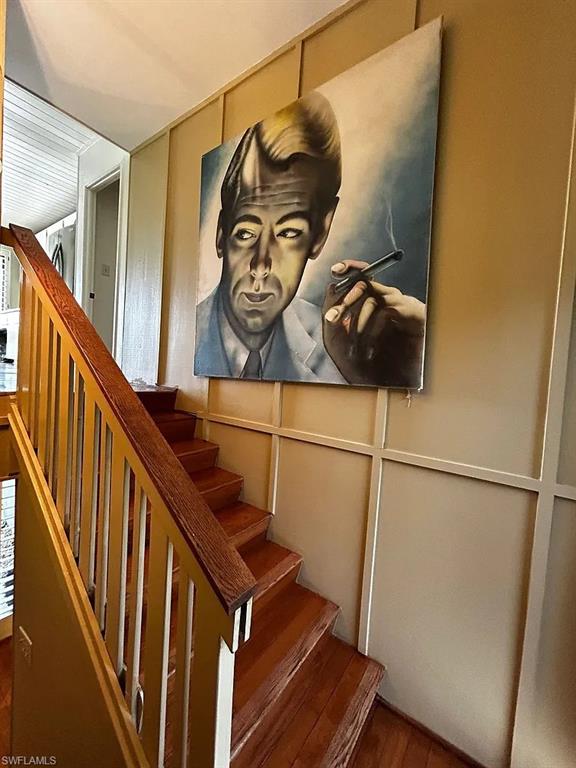 Staircase with wood finished floors