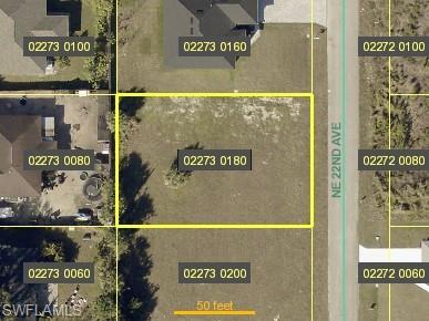 Aerial view of property's location featuring property parcel outlined