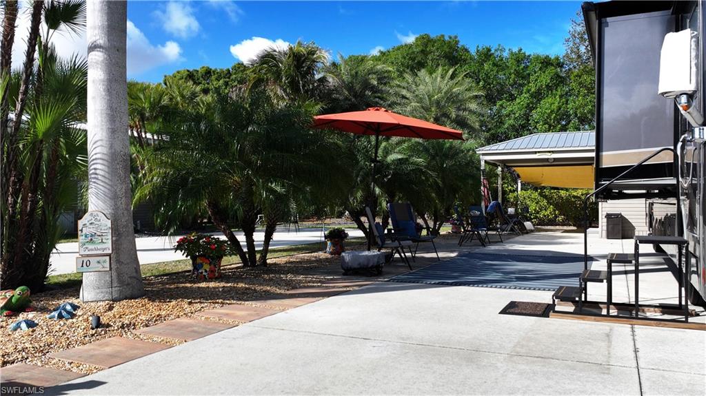View of home's community with a patio