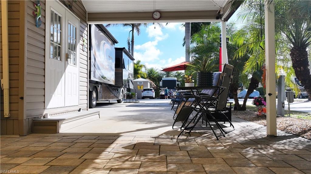 View of patio featuring outdoor dining area