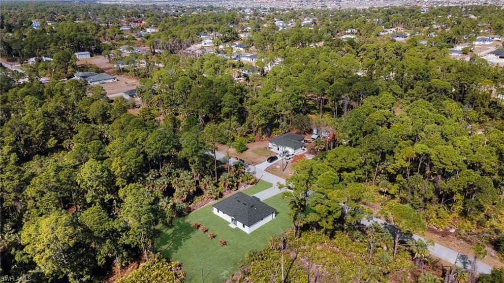 Aerial overview of property's location with a forest