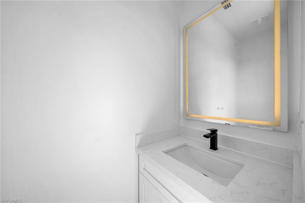 Bathroom featuring vanity