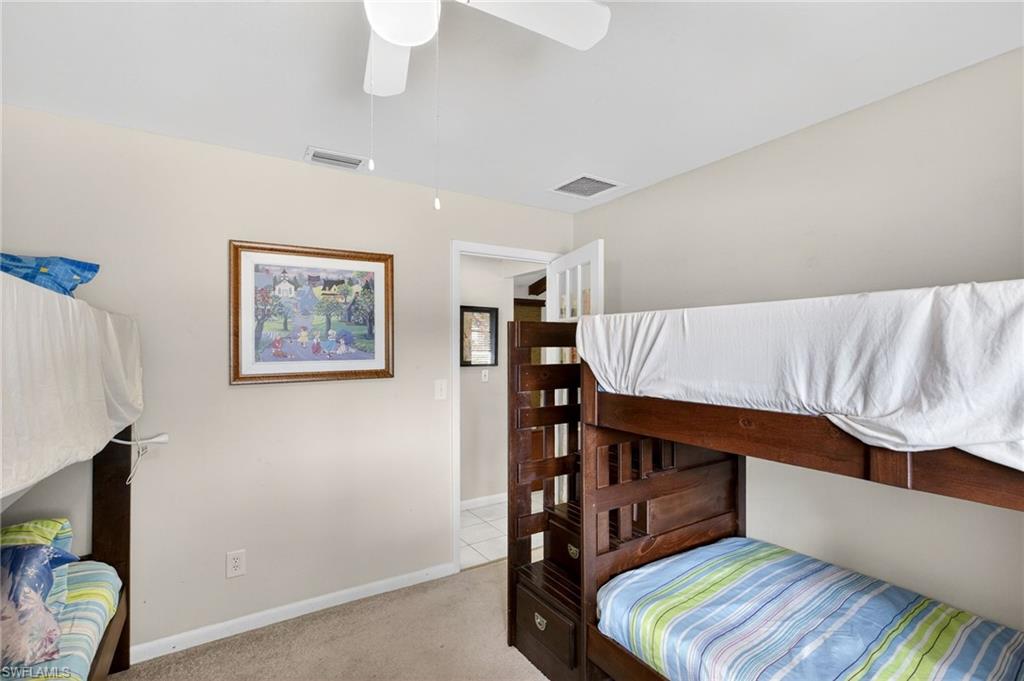 Bedroom featuring carpet floors and a ceiling fan