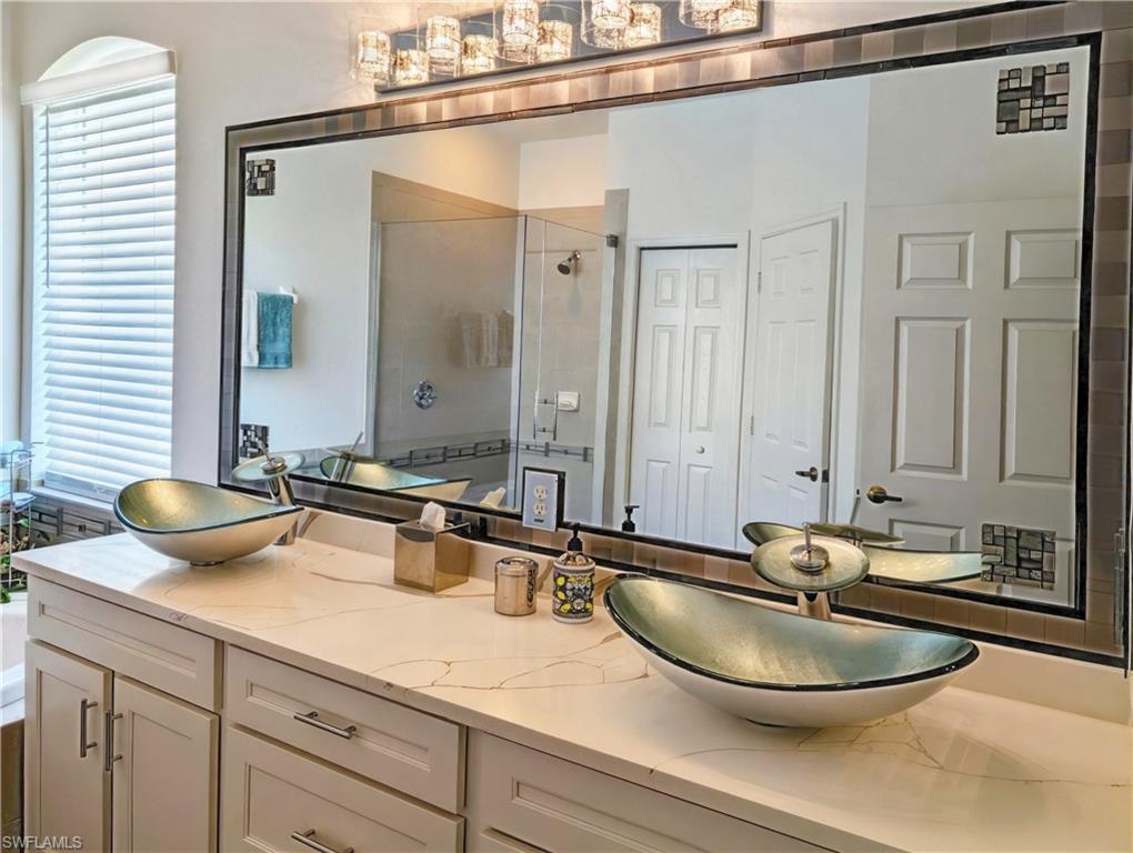 Master Bathroom featuring vanity and walk in shower