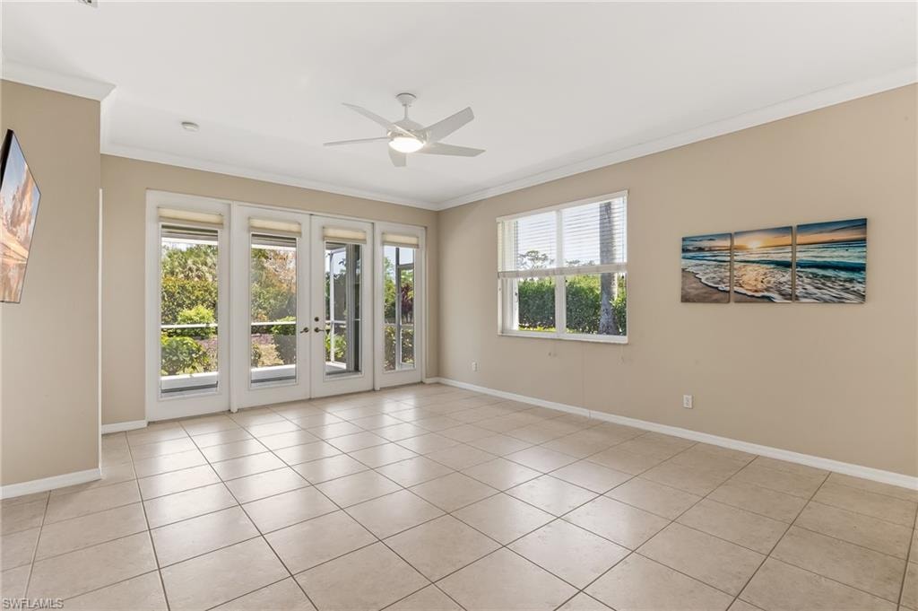 Living Room with ceramic tile, custom window treatments, fan/light fixture.