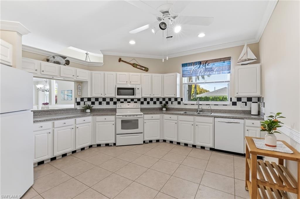 Oversized kitchen with pass-through to dining area, ceramic tile, new refrigerator.