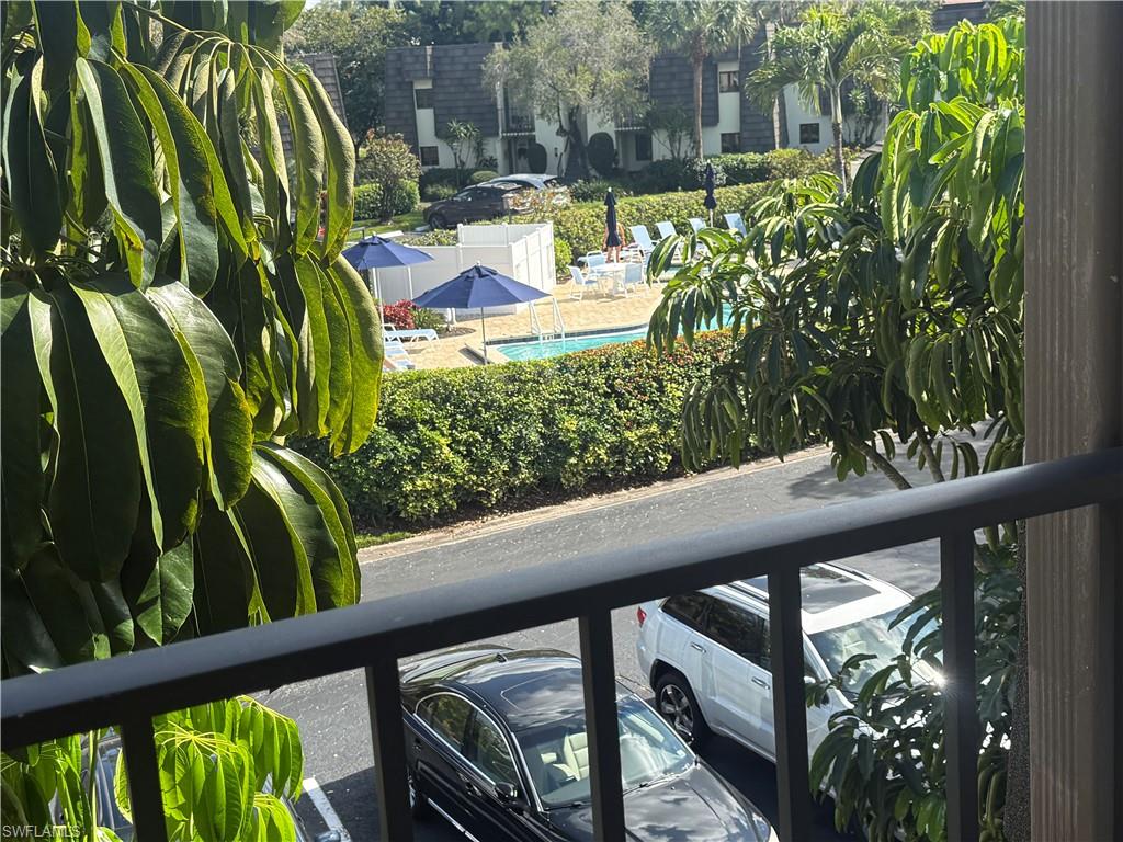 Balcony with view of pool