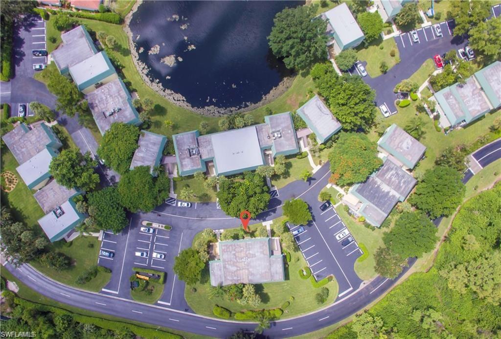 Aerial view of property's location featuring a nearby body of water