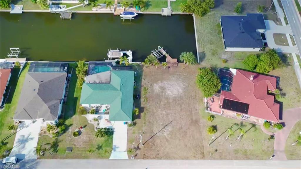 Aerial view of residential area with a gulf access canal