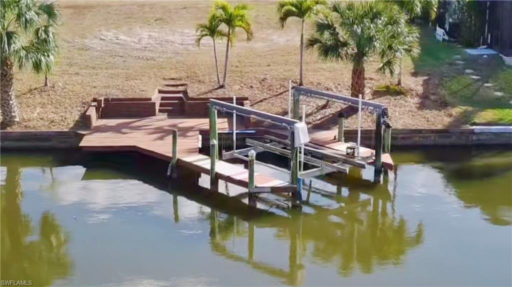 Dock area featuring boat lift