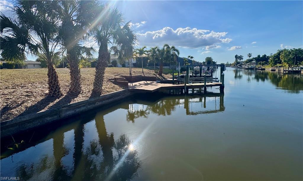 Dock featuring a water view