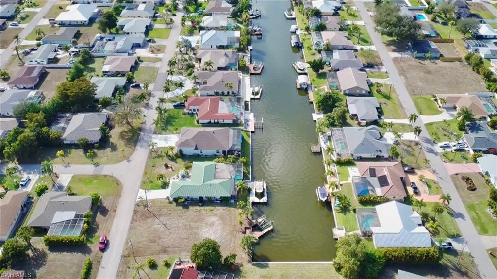 Aerial view of residential area with gulf access canal