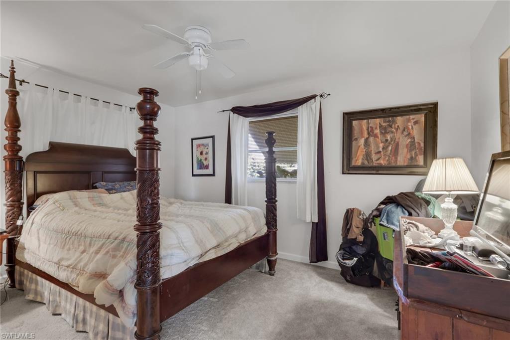 Bedroom featuring carpet floors and a ceiling fan