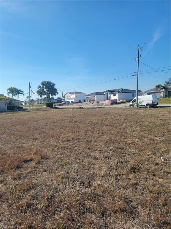 View of yard with a residential view