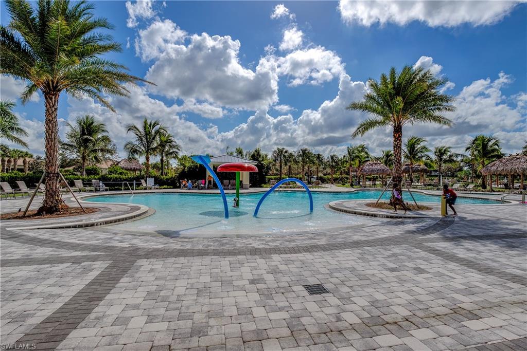 Community pool with a patio area