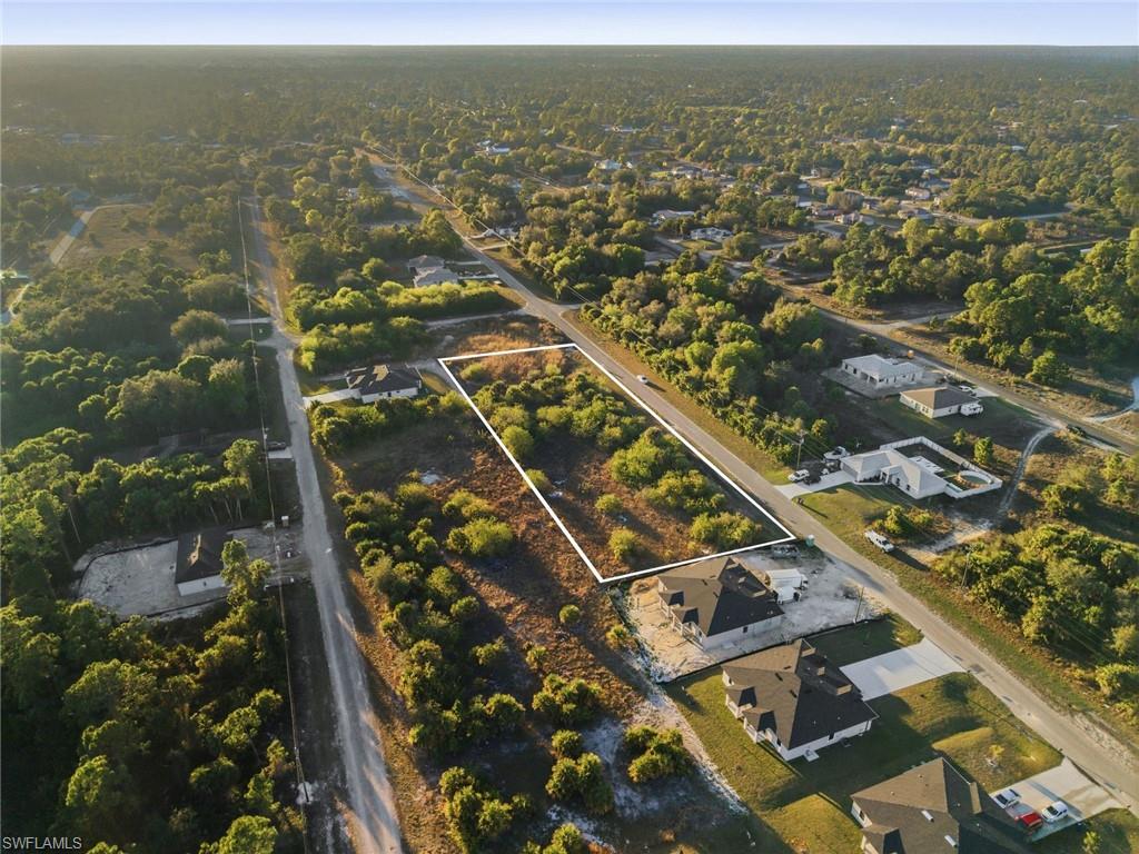 View of property location with property parcel outlined and nearby suburban area