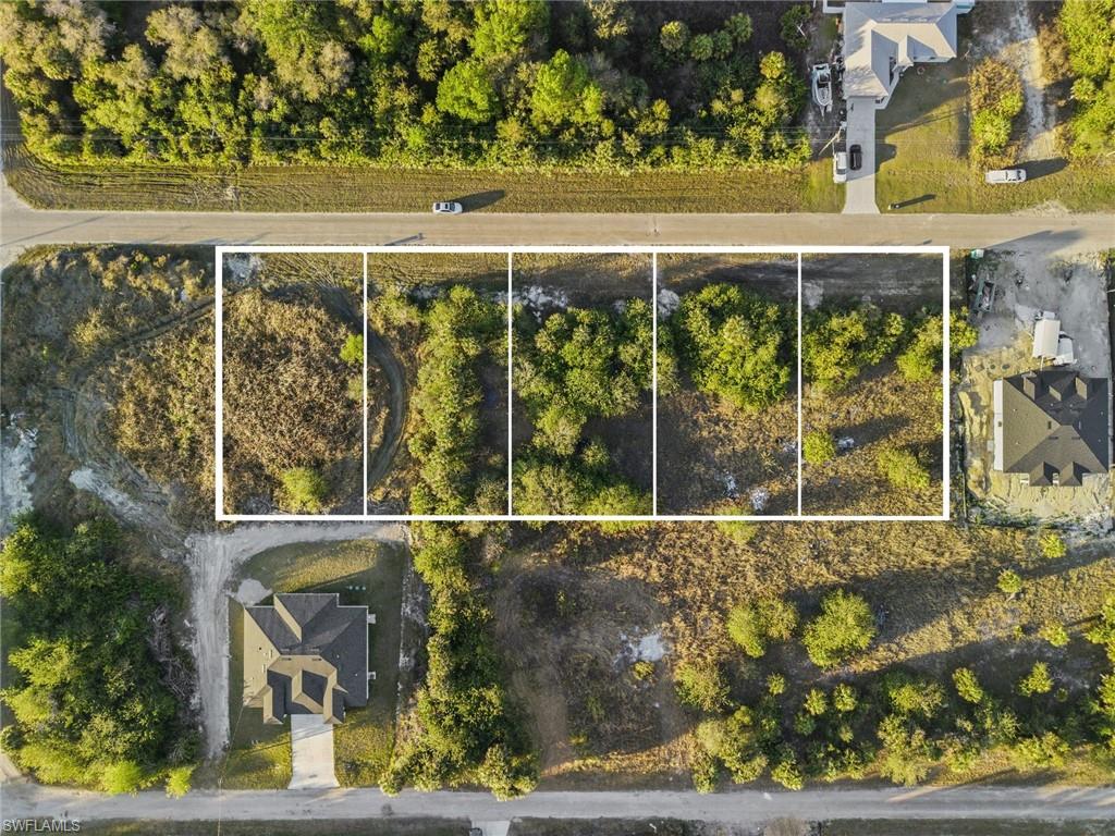 Aerial overview of property's location featuring property boundaries highlighted