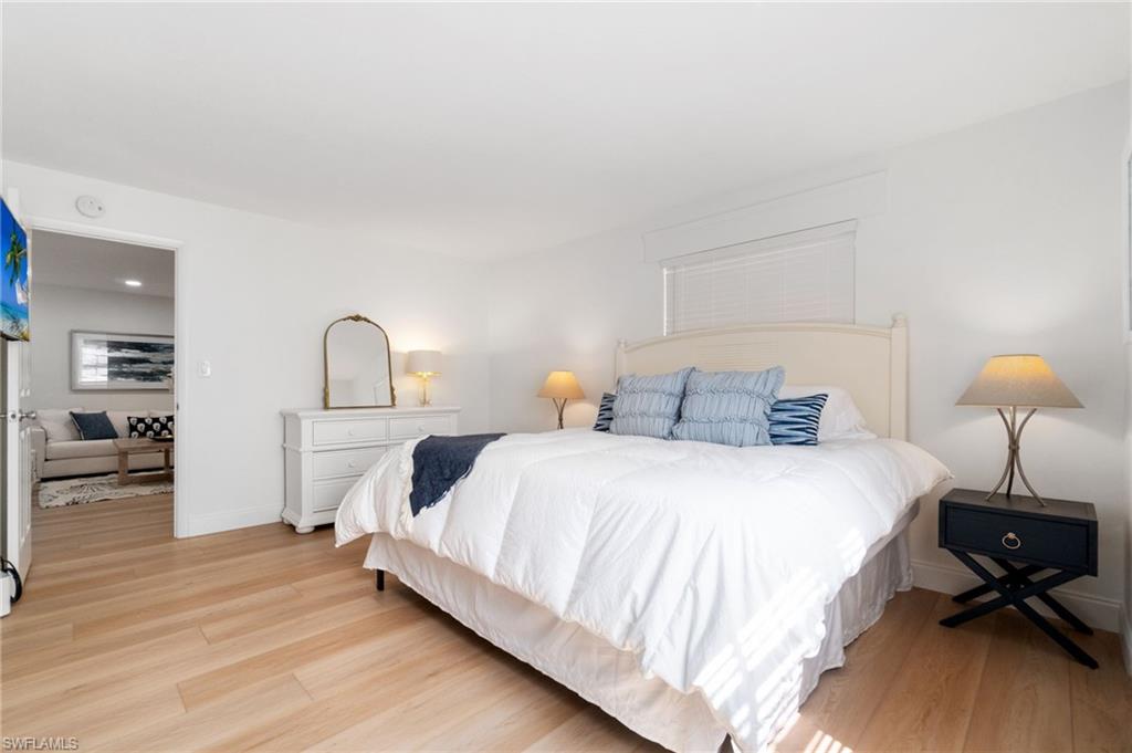 Bedroom with light wood finished floors