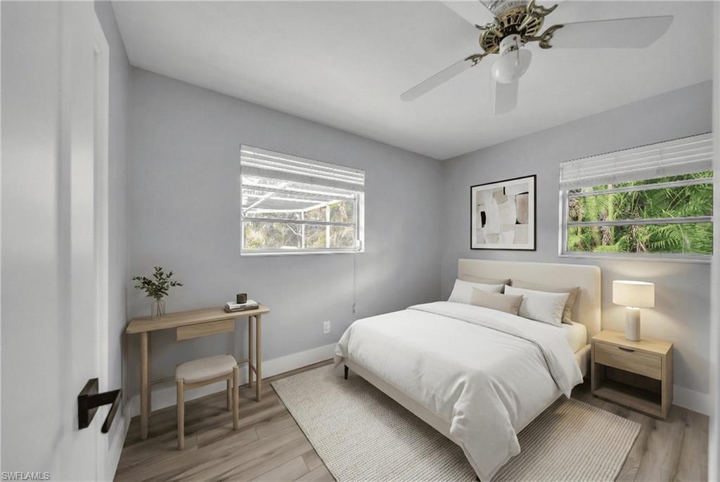 Bedroom featuring light wood-type flooring and ceiling fan