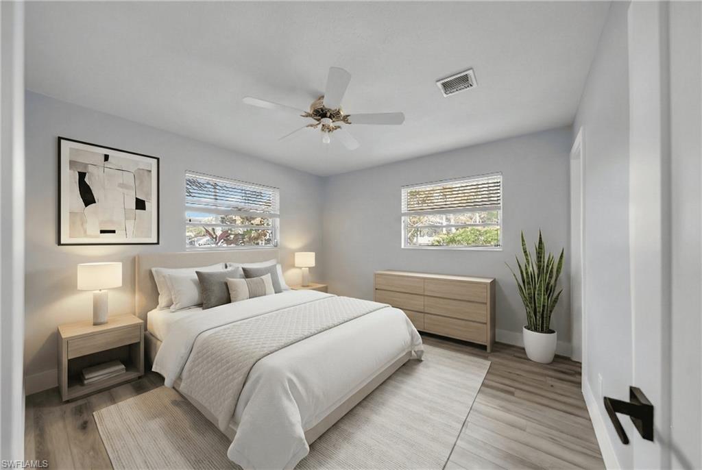 Bedroom with light wood-style flooring and ceiling fan