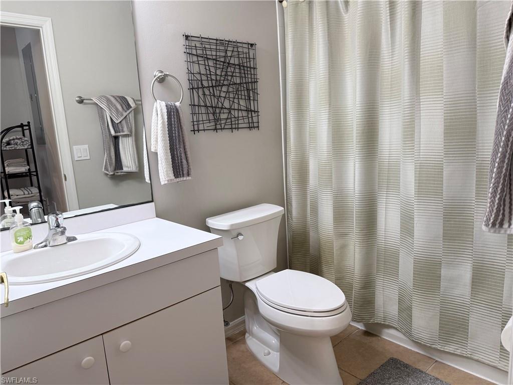 Guest bathroom with tub shower.
