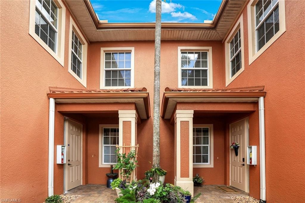 Property entrance featuring stucco